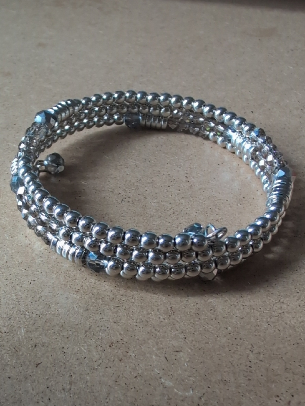 Silver Beaded Wrap Coil Bracelet with Faceted Accents